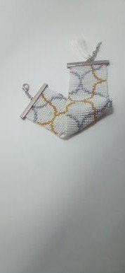 Pulsera onda dorada metal y borlas 4